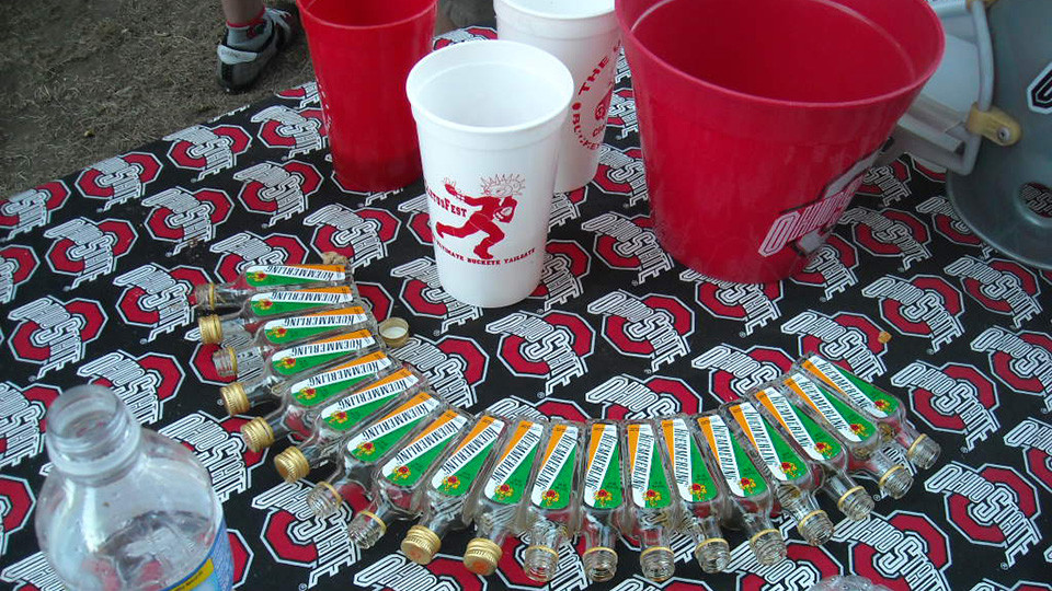 Tailgate table with alcohol